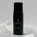 PRISTINE Leather Foam Cleaner 100 mL bottle standing on white fabric.