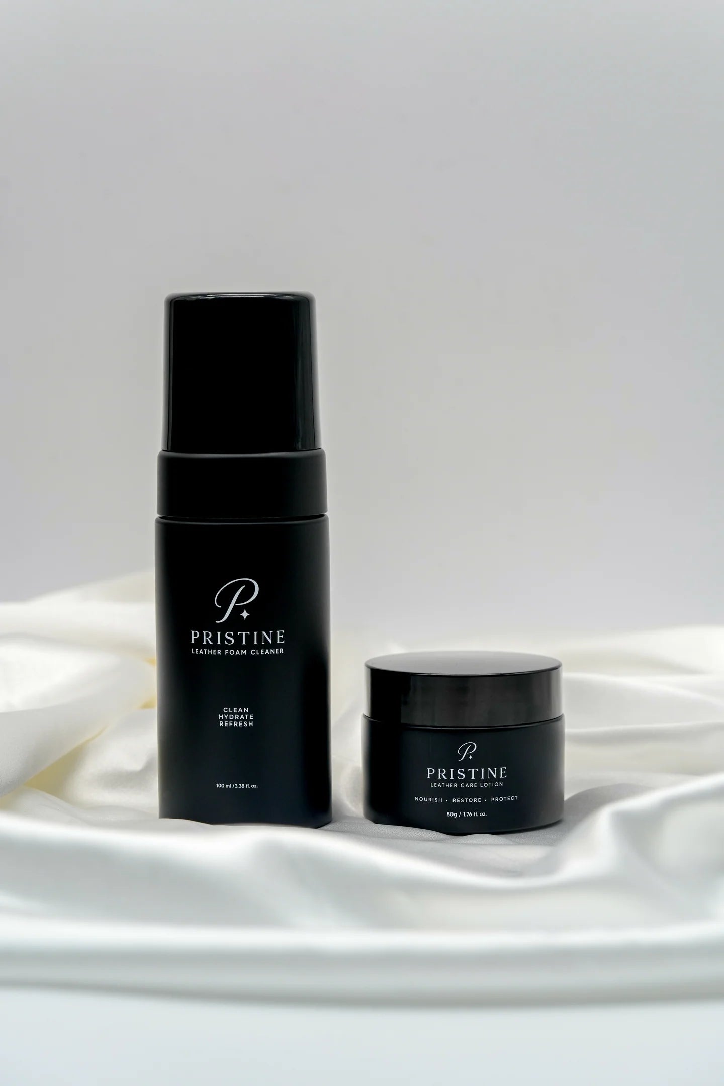 PRISTINE Foam Cleaner and Care Lotion on ivory fabric