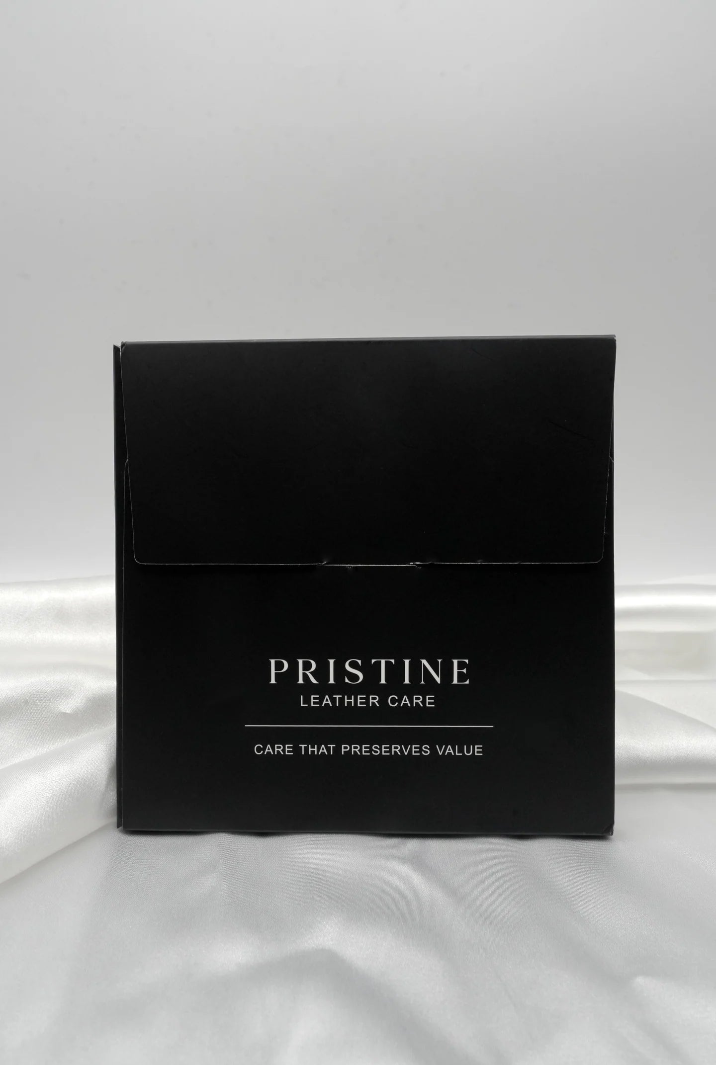 PRISTINE booklet box with the printed line Care That Preserves Value